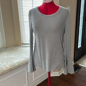 Blue/white pinstriped long sleeve tee with bell sleeves.